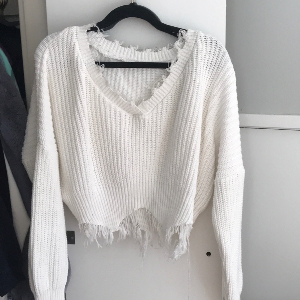 White distressed sweater